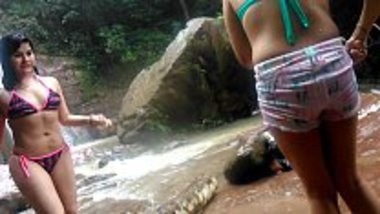 Indian bikini girls having fun in the waterfalls