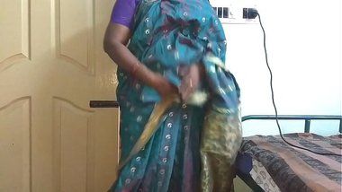 desi indian tamil telugu kannada malayalam hindi horny cheating wife vanitha wearing blue colour saree showing big boobs and shaved pussy press hard b