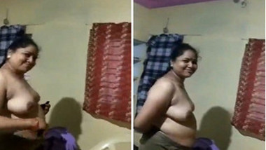 Curious Indian man films naked XXX mistress while she dresses after sex