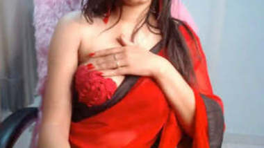 Beauty in Red Saree Pressing her boobs looking stunning