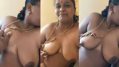 Stepson squeezes his stepmom’s big boob in nude MMS